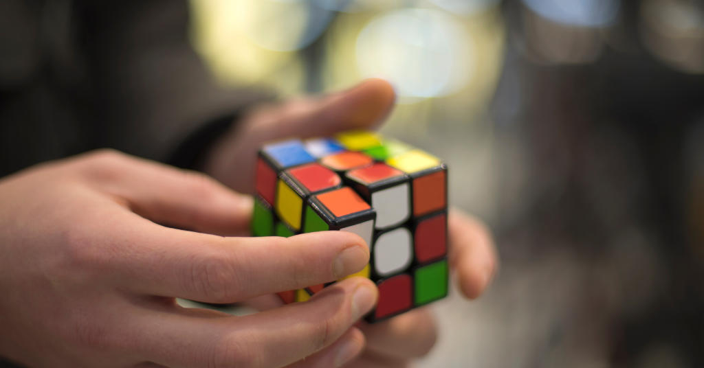 Kid solving a Rubik's cube