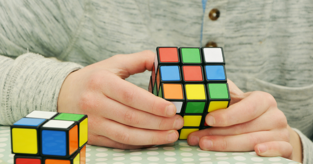 Kid solving a Rubik's cube