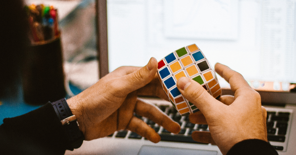 Kid solving a Rubik's cube