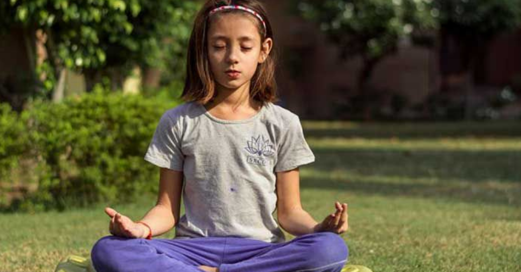 kid doing meditation