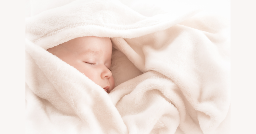 Baby sleeping in blanket