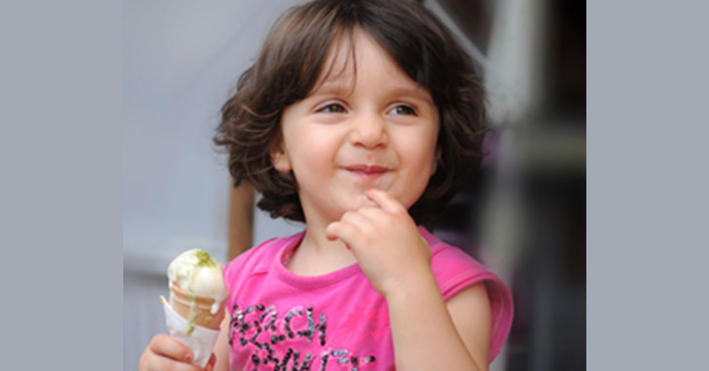 A kid eating ice-cream