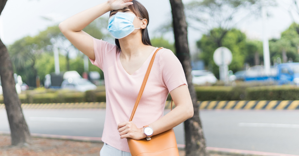 woman feeling irritated from summer heat