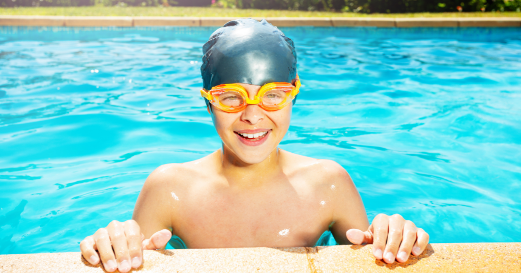  boy smiling from the pool