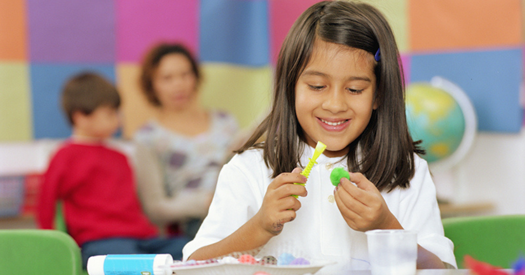 girl doing craft