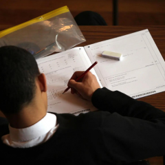 Kid giving exam