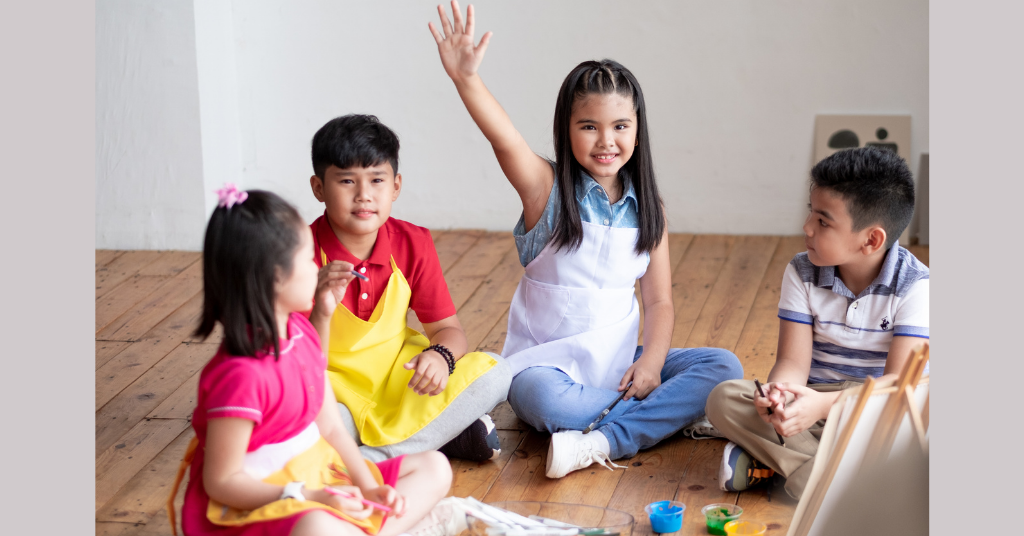 group of kids painting