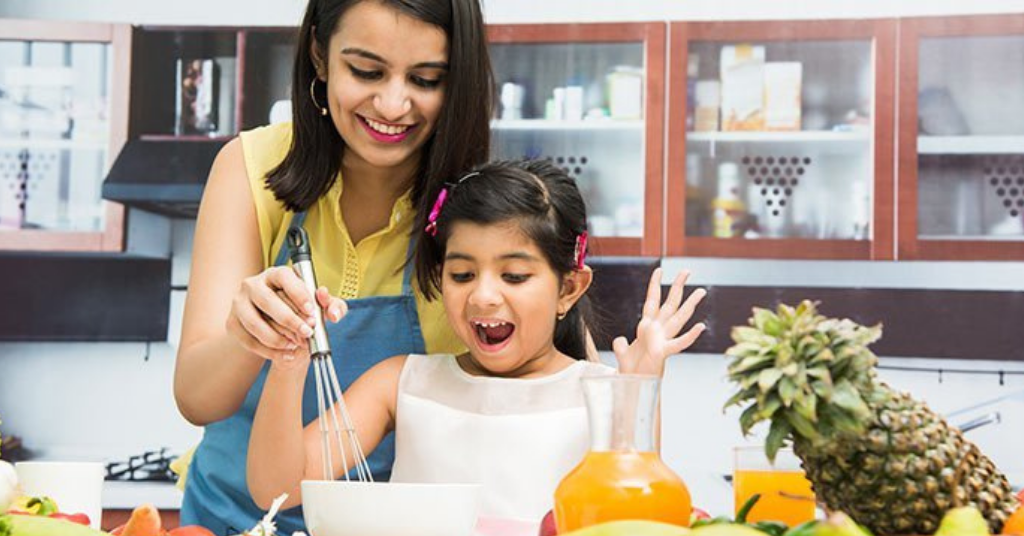 Mother and daughter cooking