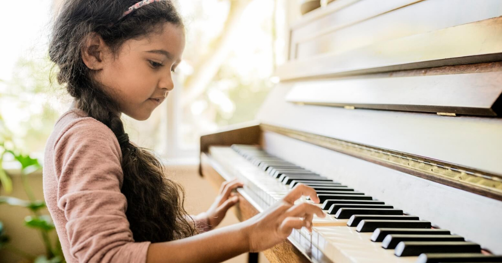 Girl playing a piano