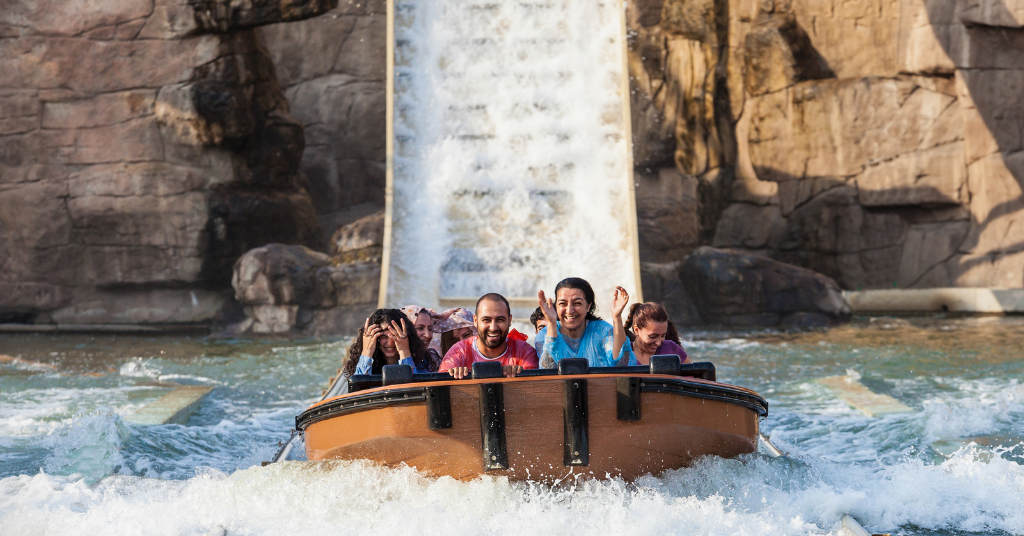 Family enjoying on a water slide