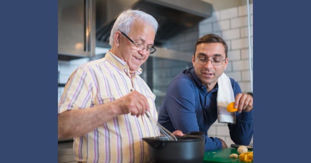 Father and son cooking together