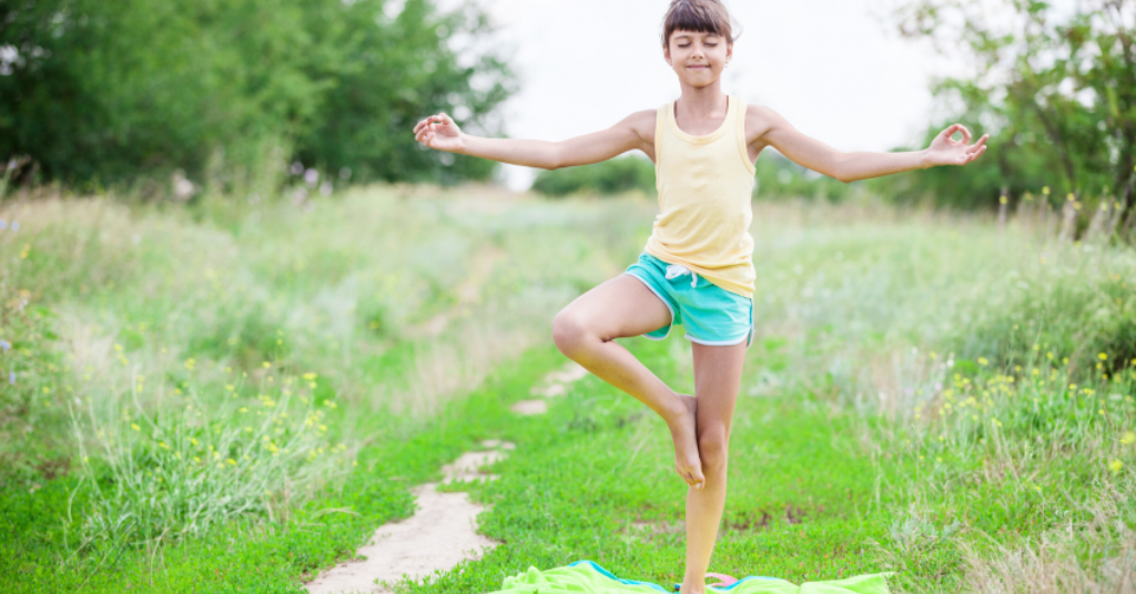 girl doing tree pose