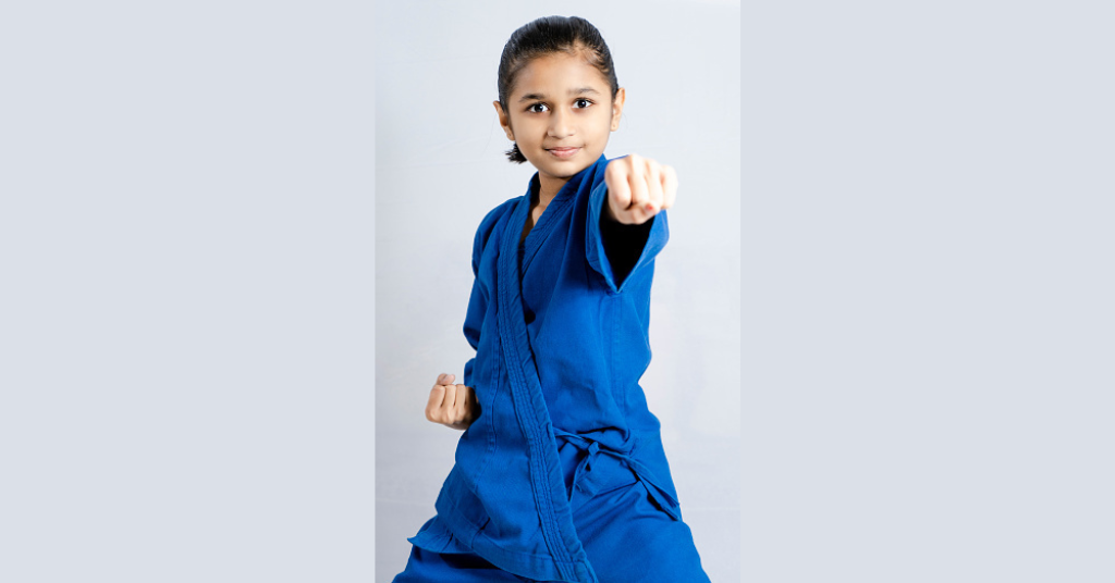 a girl showing self-defense skills