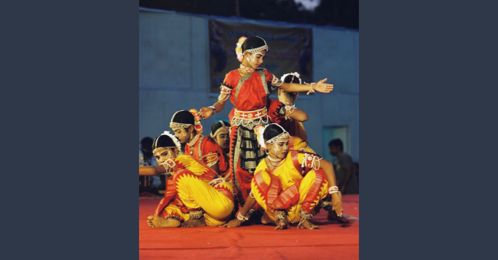 A group of dancers dancing on-stage