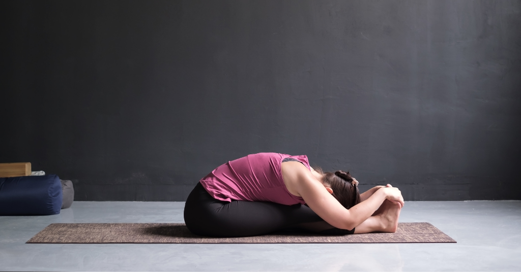 Seated Forward Bend Yoga Pose (Paschimottanasana)